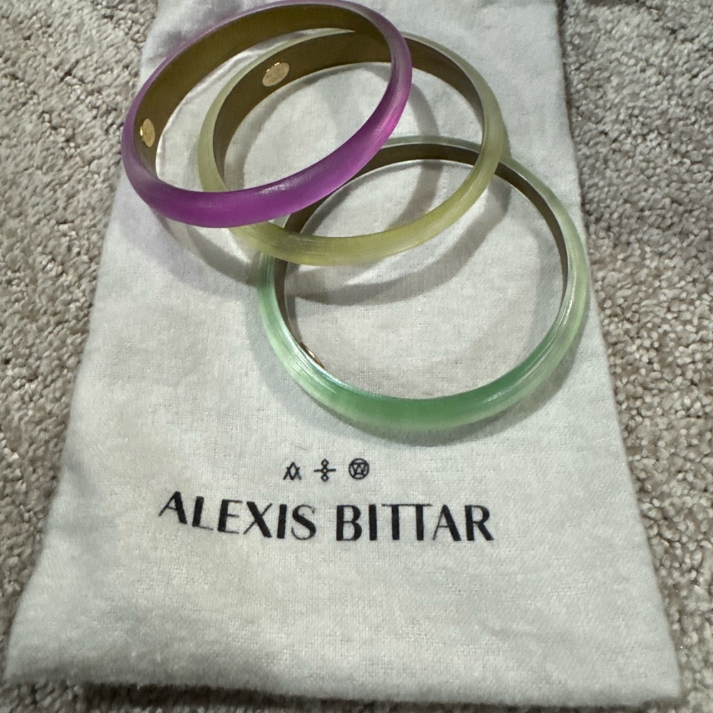 (3) Alexis Bittar Lucite tapered bangles includes storage bag